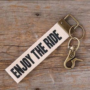 natural life enjoy the ride key fob